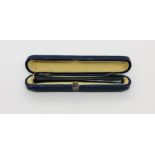 An Art Deco cheroot holder in fitted case