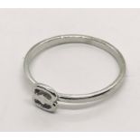 An 18ct white gold ring ( size P), weight 2g