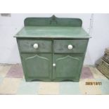 A painted Victorian pine sideboard with two drawers and cupboard under