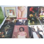 A collection of 12" vinyl records including Pink Floyd, The Beatles, ELO, Paul Simon, Cliff Richard,