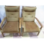 A pair of mid century armchairs