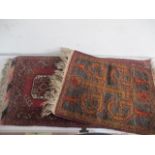 Two eastern style rugs