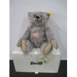 A boxed Steiff "Ultimate Bear" with growler