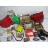 A collection of vintage car parts, mainly for MG Midget etc