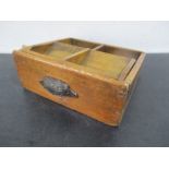A vintage wooden cash drawer