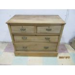 A satin wood chest of four drawers