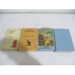 A collection of four books by Capt. W E Johns. Worrals carries on in hardback cover and Worrals in