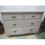 A painted satinwood chest of four drawers