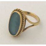 A 9ct gold ring set with an opal