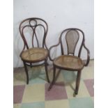 A vintage bentwood rocking chair along with a single bentwood chair
