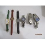 A box of assorted watches including Animal etc