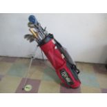 A set of golf clubs including Ping, Slazenger, Tensor with bag.