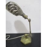 A Dugdill Patent brass adjustable desk lamp on hexagonal base with shell shaped shade