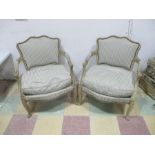 A pair of Louis XIV style French carver chairs