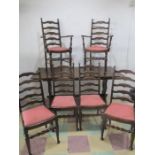An oak refrectory table and six chairs including two carvers