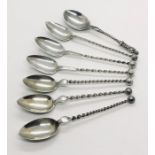A set of Scandinavian 830 silver coffee spoons with twist stems along with a hallmarked silver