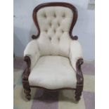 A button back Victorian gentleman's armchair