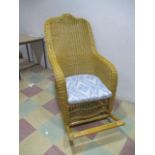 A large wicker rocking chair