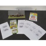 A collection of model building kits and building for N gauge railway