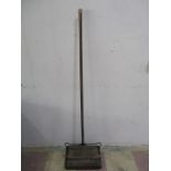 A vintage Ewbank carpet sweeper