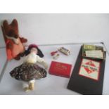 A collection of toys and games including a vintage monopoly set , a Basil Brush soft toy, a Kammer &