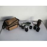A Zenit B camera plus two lenses, flash and carry case