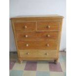 A pine chest of five drawers