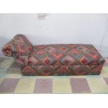 An upholstered day bed/ottoman