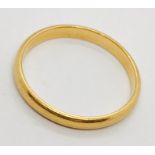 A 22ct gold wedding band. Weight 3.5g