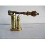 Brass and steel shot gun cartridge loading, decapping tool with wooden handle.