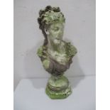 A well weathered plaster bust of a lady - height approx. 65cm