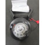 A Plastimo offshore 75 marine compass with fixings