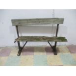 An industrial cast iron garden bench with folding seat and metal frame A/F