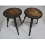 Two small transfer printed "milking" stools with three legs