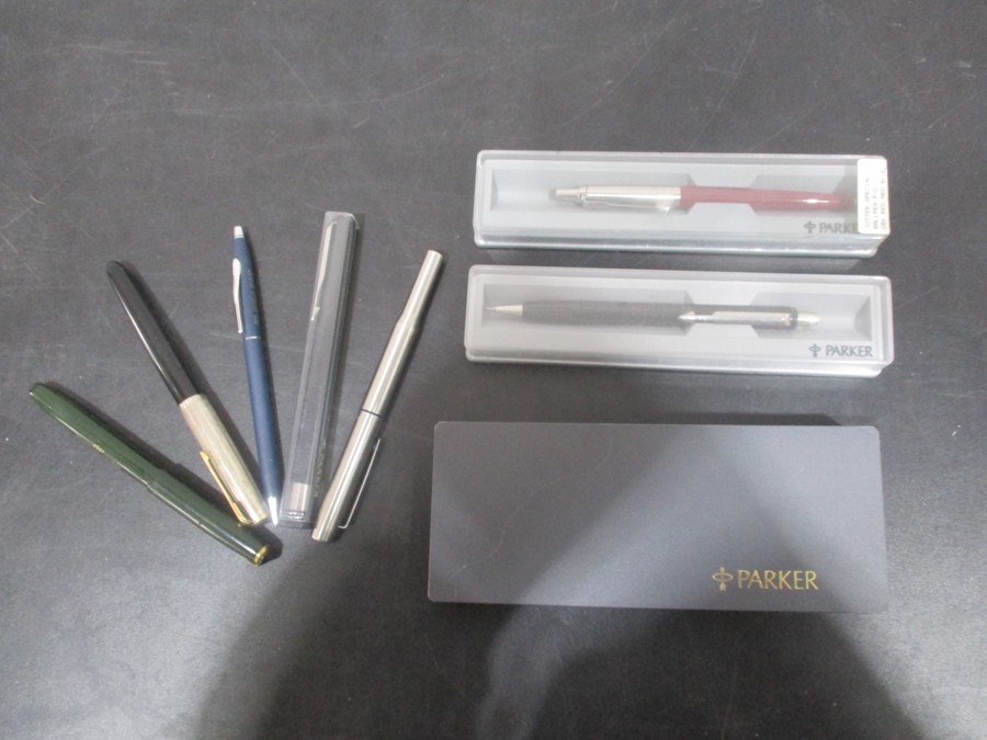 A collection of Parker pens etc