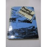 Hardback "Project Cancelled" by Derek Wood. Bound in blue cloth with gold lettering on spine and