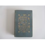 Hardback "In The Roar Of The Sea" by S Baring Gould. Bound in blue deco on front board on spine