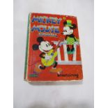 Hardback "Mickey Mouse Annual" by Walt Disney Entertaining. Bound in decorated boards and spine.