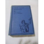 Hardback "The Lost Empire" by Flight Lieut. S.C. George. Bound in blue cloth with black lettering