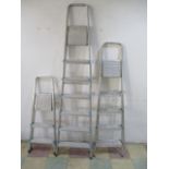 Three sets of Beldray aluminium step ladders