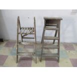 Two vintage wooden stepladders