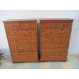 A pair of pine chests of seven drawers