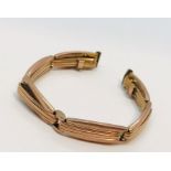 A 9ct rose gold expandable watch strap, weight 6g