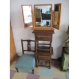 A nursing chair, along with a pair of bedside tables and pine mirror