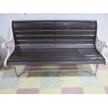 A garden bench with cast iron ends