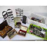 A quantity of costume jewellery in boxes and loose