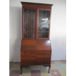 A bureau bookcase on cabriole legs - no key