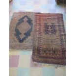 Two Eastern ground rugs