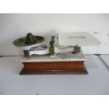 A vintage set of Day & Millward Limited shop scales with mahogany base with marble top