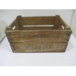 A vintage wooden apple crate, stamped marked with Justin Brooke Ltd, Wickhambrook